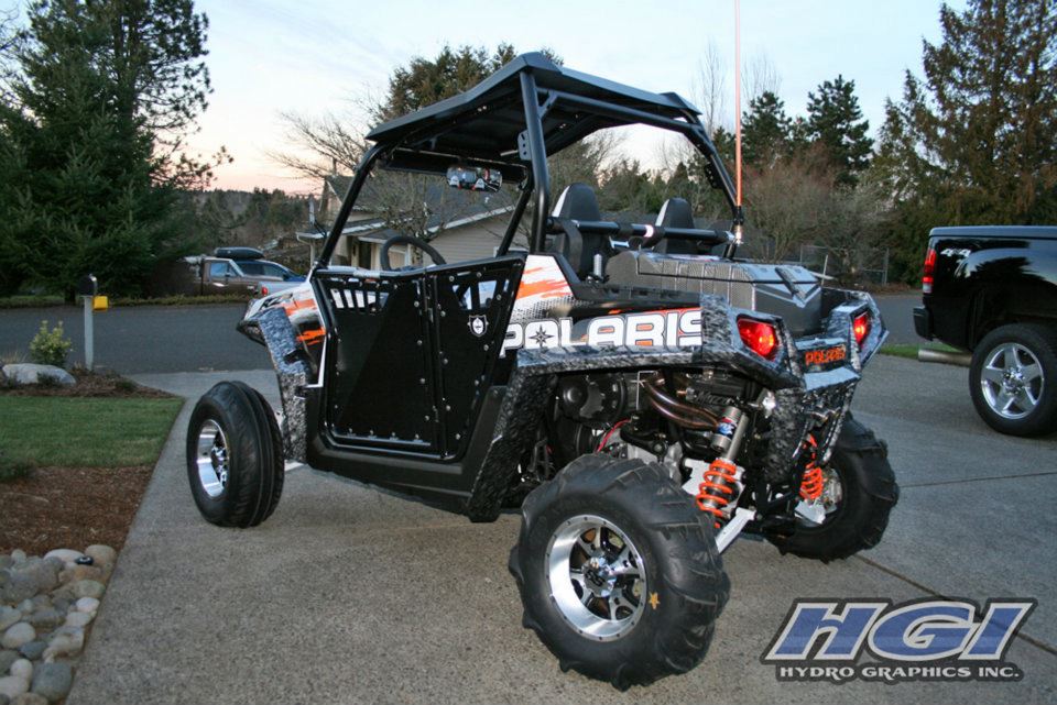 Polaris RZR with carbon fiber and Reaper HydroSkin® finishes.